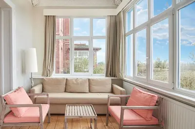 Ein Sitzbereich in der Unterkunft Villa Dünenblick Apartment Seepferdchen