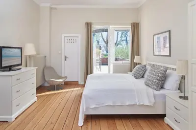 Ein Bett oder Betten in einem Zimmer der Unterkunft Villa Dünenblick Apartment Seepferdchen