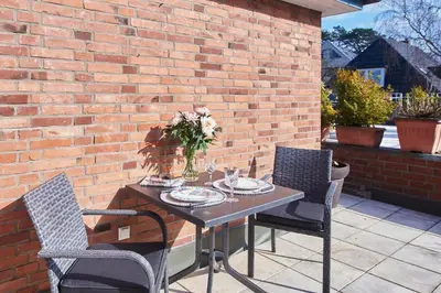Ein Balkon oder eine Terrasse in der Unterkunft Villa Dünenblick Apartment Seepferdchen