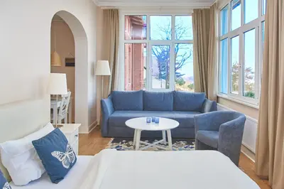 Ein Sitzbereich in der Unterkunft Villa Dünenblick Apartment Meeresbrise