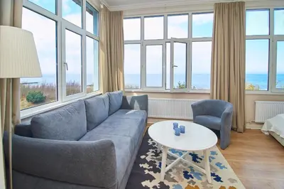 Ein Sitzbereich in der Unterkunft Villa Dünenblick Apartment Meeresbrise