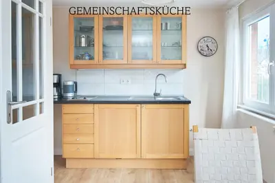 Küche/Küchenzeile in der Unterkunft Villa Dünenblick Doppelzimmer Leuchtturm