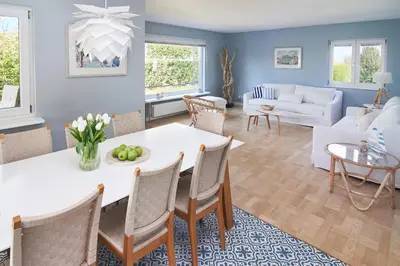 Ein Sitzbereich in der Unterkunft Villa Dünenblick Beachhouse Apartment Sunrise