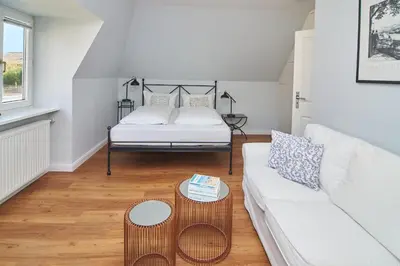 Ein Bett oder Betten in einem Zimmer der Unterkunft Villa Dünenblick Beachhouse Apartment Sunset