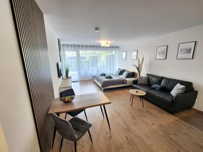 Ein Sitzbereich in der Unterkunft Meerzeit Apartment mit Terrasse & Parkplatz