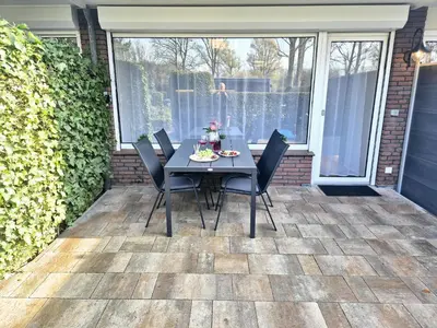 Ein Balkon oder eine Terrasse in der Unterkunft Meerzeit Apartment mit Terrasse & Parkplatz