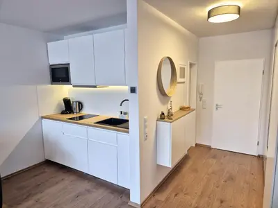 Küche/Küchenzeile in der Unterkunft Meerzeit Apartment mit Terrasse & Parkplatz