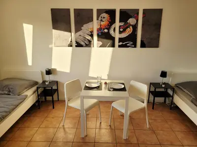 Ein Bett oder Betten in einem Zimmer der Unterkunft Work & Relax Apartment in Industrial area