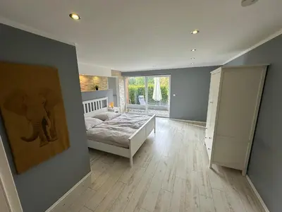 Ein Bett oder Betten in einem Zimmer der Unterkunft Landhof Schadehorn 