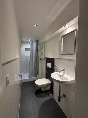 Ein Badezimmer in der Unterkunft Landhof Schadehorn 