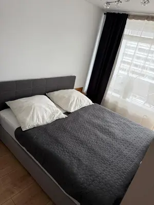Ein Bett oder Betten in einem Zimmer der Unterkunft FeWo am Hansa Park