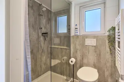 Ein Badezimmer in der Unterkunft Ostseecamp Ferienhaus 