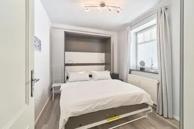 Ein Bett oder Betten in einem Zimmer der Unterkunft Strandallee 150a Timmendorfer Strand