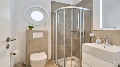 Ein Badezimmer in der Unterkunft Haus Meerzeit, Wohnung Düne, 250 m vom Strand, Hunde willkommen