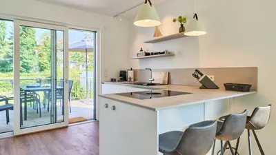 Küche/Küchenzeile in der Unterkunft Haus Meerzeit, Wohnung Düne, 250 m vom Strand, Hunde willkommen
