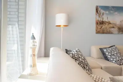 Ein Sitzbereich in der Unterkunft Ferienwohnung Ostseekoje - Haffkrug