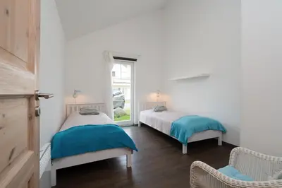 Ein Bett oder Betten in einem Zimmer der Unterkunft Strandpark Sierksdorf H051