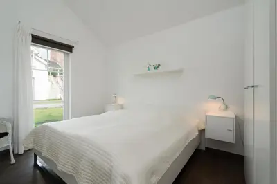 Ein Bett oder Betten in einem Zimmer der Unterkunft Strandpark Sierksdorf H051