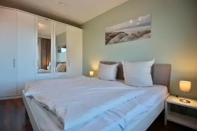 Ein Bett oder Betten in einem Zimmer der Unterkunft Carpe Diem Appartement 189