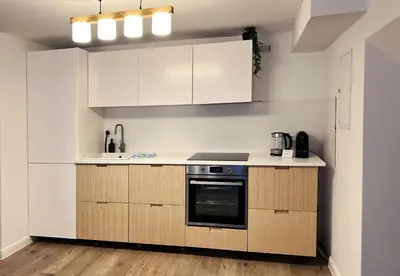 Küche/Küchenzeile in der Unterkunft Moderne Lounge-Ferienwohnung mit Terrasse, Strandkorb, Parkplatz - 50 Meter zum Strand