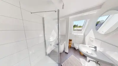 Ein Badezimmer in der Unterkunft De lütte Koje