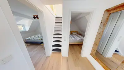 Ein Bett oder Betten in einem Zimmer der Unterkunft De lütte Koje