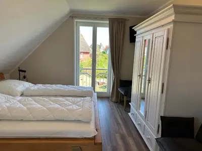 Ein Bett oder Betten in einem Zimmer der Unterkunft Seestern