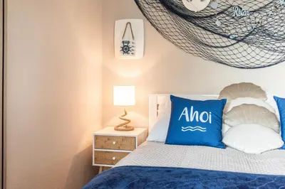 Ein Bett oder Betten in einem Zimmer der Unterkunft Ferienwohnung Wind Sonne Wellen - Scharbeutz
