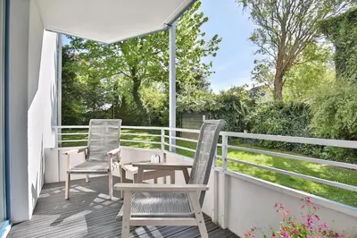 Ein Balkon oder eine Terrasse in der Unterkunft Ferienanlage Bergstraße 62 Ferienhaus Bergstraße 62 Appartement 5 Tide am Park