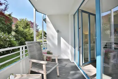 Ein Balkon oder eine Terrasse in der Unterkunft Ferienanlage Bergstraße 62 Ferienhaus Bergstraße 62 Appartement 5 Tide am Park