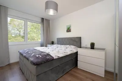 Ein Bett oder Betten in einem Zimmer der Unterkunft Bergfried