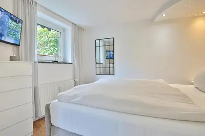Ein Bett oder Betten in einem Zimmer der Unterkunft Haus am Nöltingsweg 
