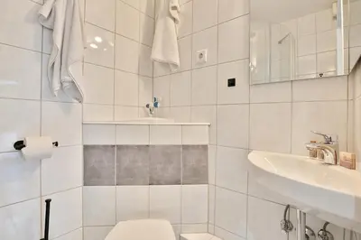 Ein Badezimmer in der Unterkunft Haus am Nöltingsweg 