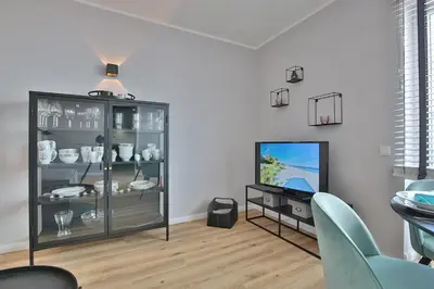 TV/Unterhaltungsangebot in der Unterkunft Alte Post Strandmuschel Appartement 3