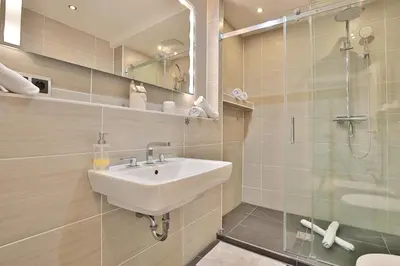 Ein Badezimmer in der Unterkunft Alte Post Strandmuschel Appartement 3