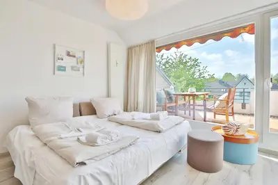 Ein Bett oder Betten in einem Zimmer der Unterkunft Haus Adria Appartement 27 Ostseegöre