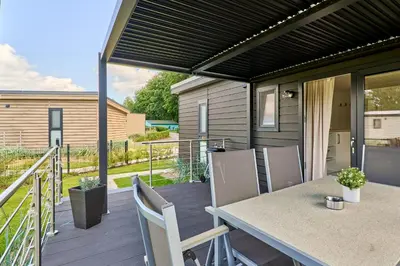 Ein Balkon oder eine Terrasse in der Unterkunft Ostseecamp Ferienhaus 