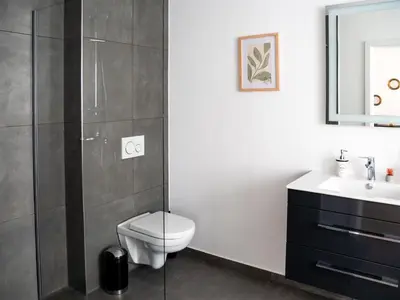 Ein Badezimmer in der Unterkunft Die kleine Lotti