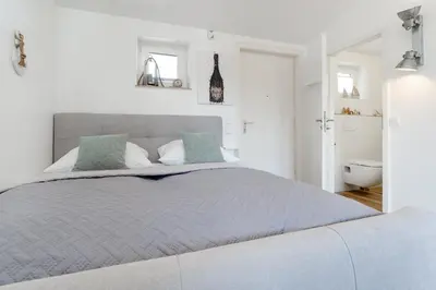 Ein Bett oder Betten in einem Zimmer der Unterkunft Montemare Sonnenanbeter
