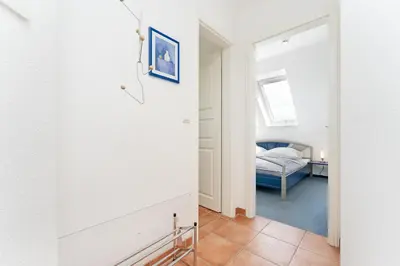 Ein Bett oder Betten in einem Zimmer der Unterkunft Nimm dir Zeit für Meer