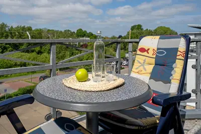 Ein Balkon oder eine Terrasse in der Unterkunft Nimm dir Zeit für Meer