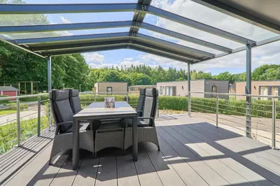 Ein Balkon oder eine Terrasse in der Unterkunft Ostseecamp Ferienhaus 