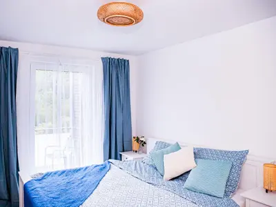 Ein Bett oder Betten in einem Zimmer der Unterkunft Flussblick am Töpferberg 4