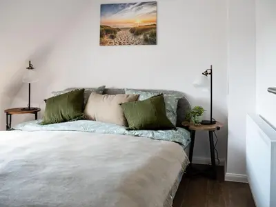 Ein Bett oder Betten in einem Zimmer der Unterkunft Ostsee Koje