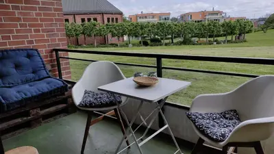 Ein Sitzbereich in der Unterkunft Relax with a pool and sauna in Trave Kieker 005!