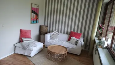Ein Sitzbereich in der Unterkunft Relax with a pool and sauna in Trave Kieker 005!