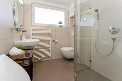 Ein Badezimmer in der Unterkunft Meerzeit 5