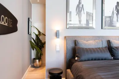 Ein Bett oder Betten in einem Zimmer der Unterkunft Ferienwohnung Hang Loose Scharbeutz