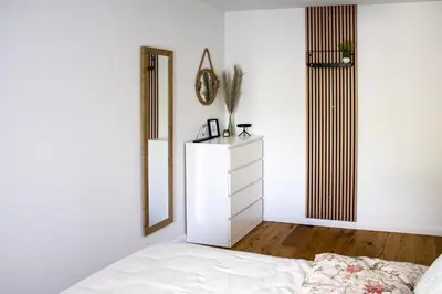 Ein Bett oder Betten in einem Zimmer der Unterkunft Flussblick am Töpferberg 2