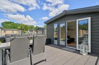 Ein Balkon oder eine Terrasse in der Unterkunft Ostseecamp Ferienhaus 